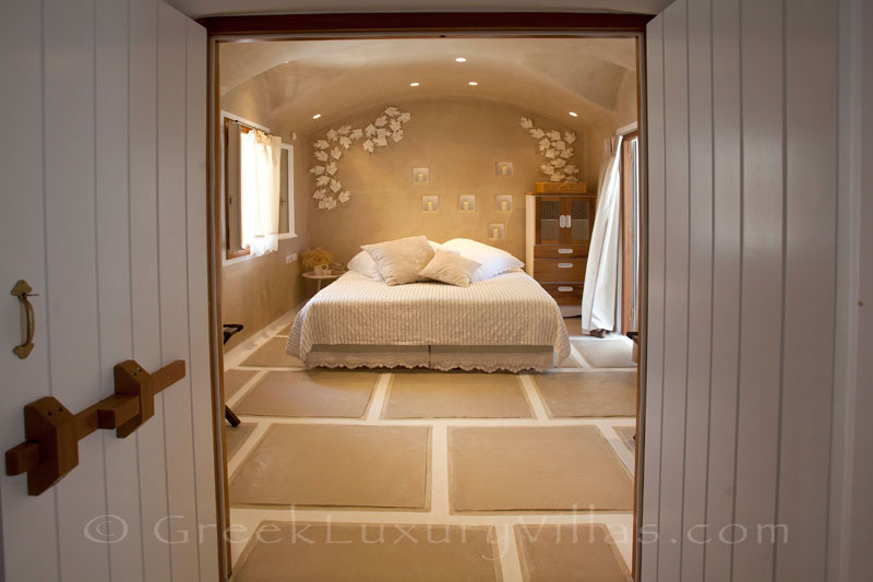 A romantic bedroom in a luxury villa with a pool in Naxos