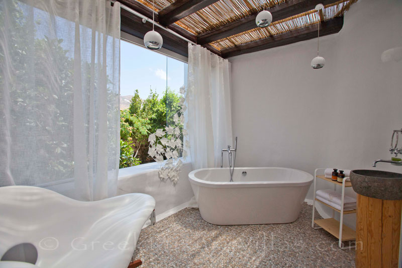 A romantic bathroom of a luxury villa with a pool in Naxos