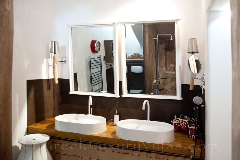 A luxurious bathroom of a luxury villa with a pool in Naxos