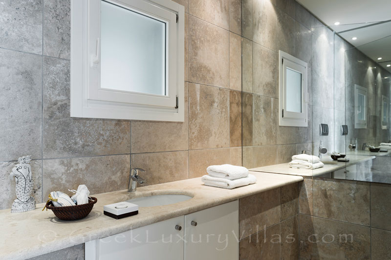bathroom at beachfront villa with tennis court