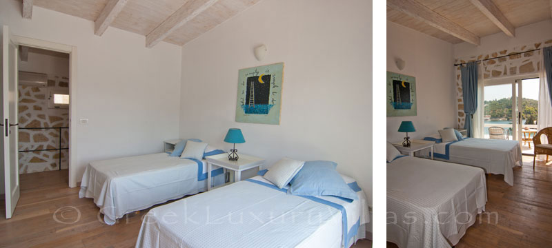 Bedroom with seaview in a luxury villa with a pool in Paxos