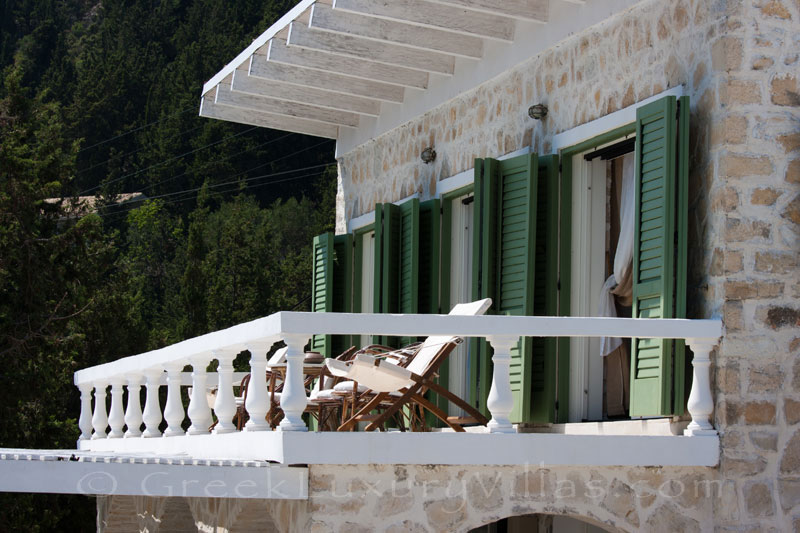 A balcony with seaview in a waterfront luxury villa in Paxos