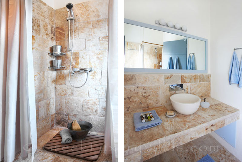 The bathroom in a beachfront villa with a pool in Paxos