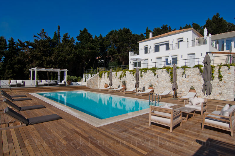 A modern luxury villa with a big pool area with seaview in Paxos