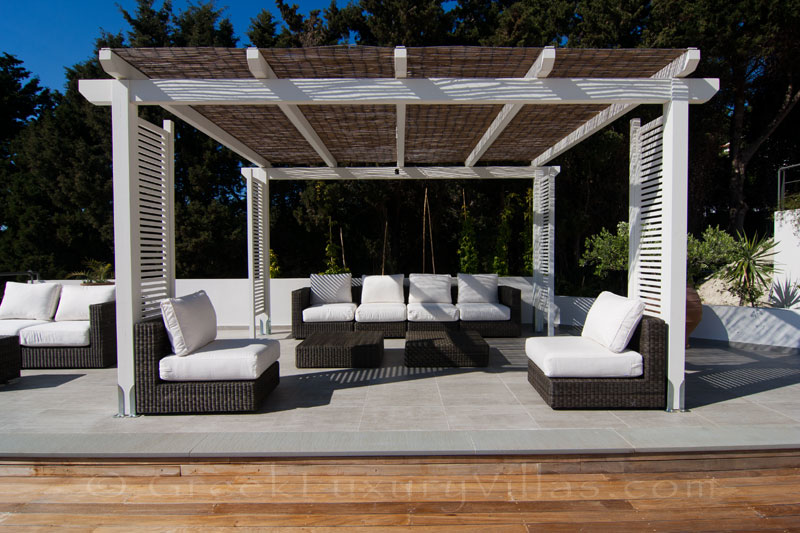 The lounge with seaview of the pool bar area of a modern luxury villa in Paxos