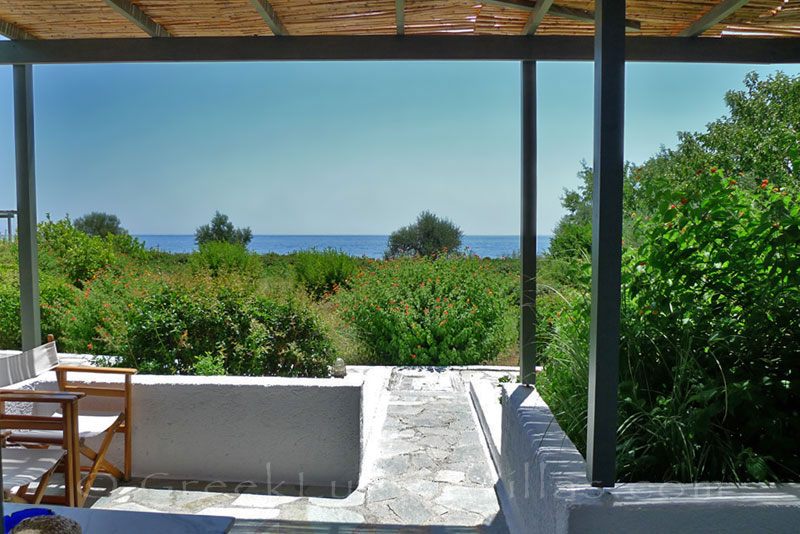 Verandah of beach bungalows in Peloponnese overlooking the sea
