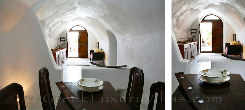 A luxurious dining room in a villa with a pool in a traditional village in Santorini