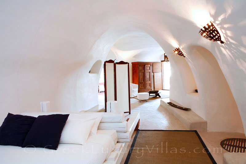 The cave style bedroom of  the villa in a traditional village in Santorini