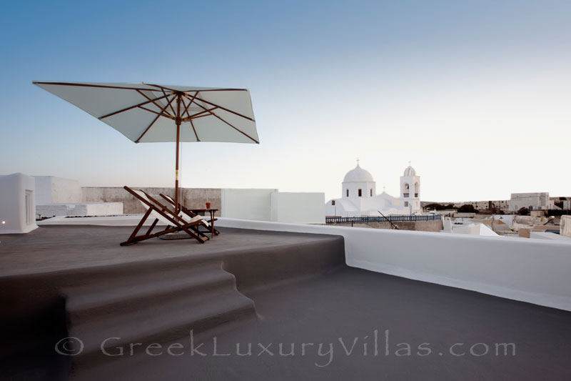 A roof-top terrace of a contemporary luxury villa in Santorini
