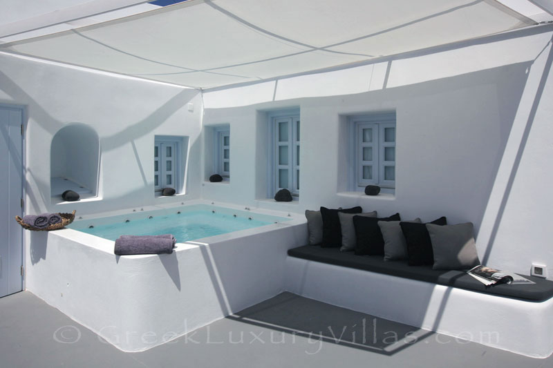 A contemorary luxury villa with a jacuzzi in Santorini