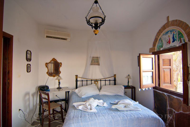 A bedroom with sea view in the windmill with a garden near the beach in Skyros