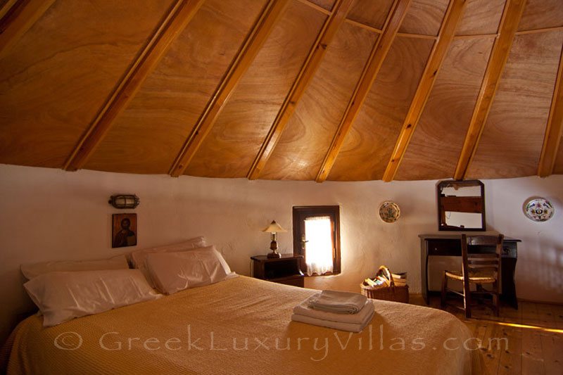 The bedroom in a windmill near the beach in Skyros