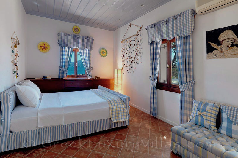Bedroom of traditional beachfront villa in Skyros