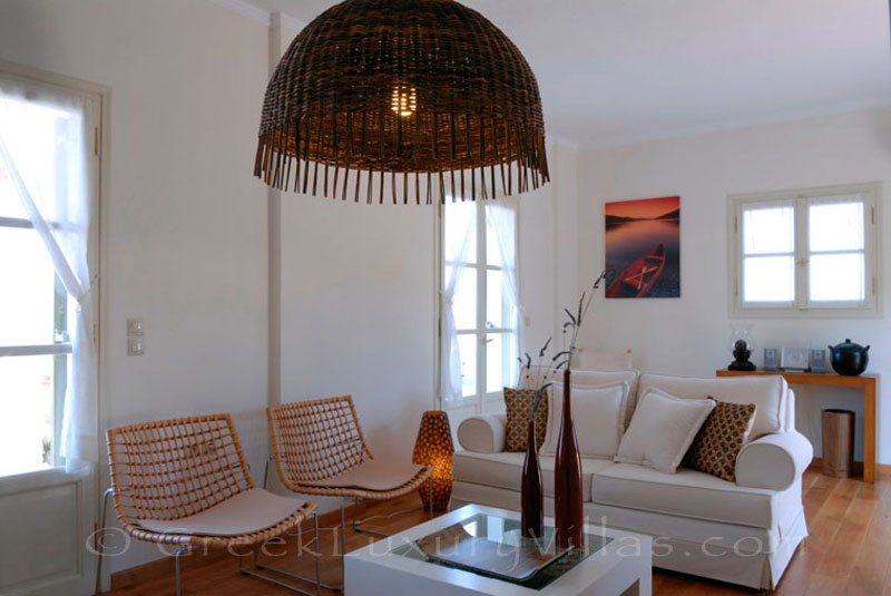 The living-room of a luxury villa with a pool in Spetses