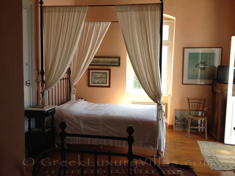 Bedroom of neoclassical villa for large groups on Syros