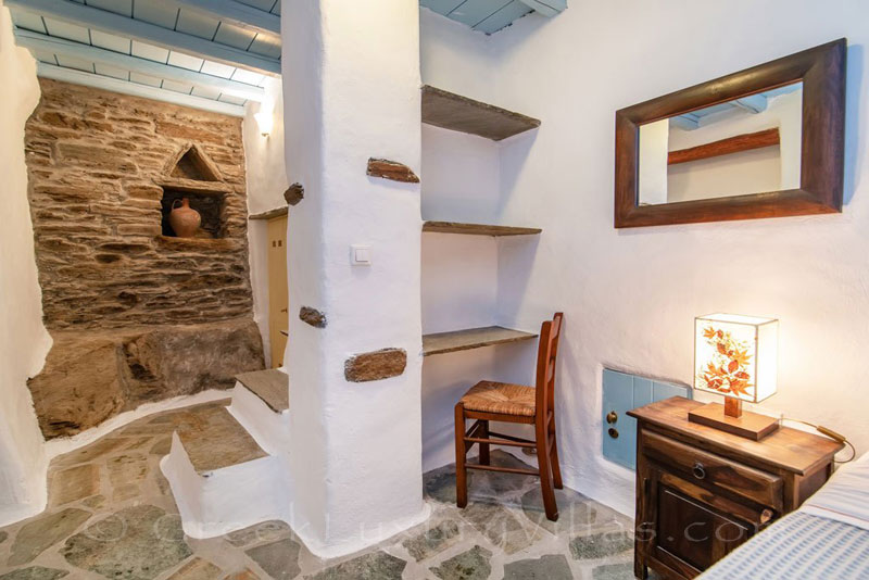 bedroom of traditional villa in Tinos