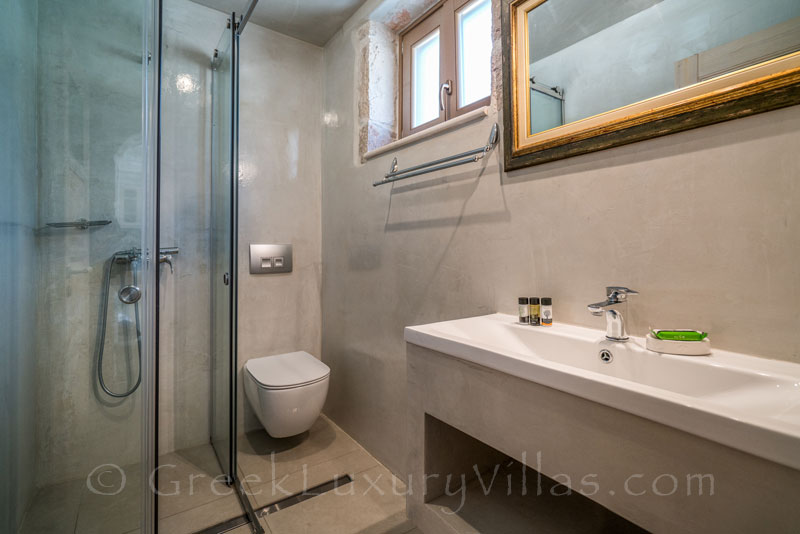 The bathroom of a seaview villa with a pool in Zakynthos