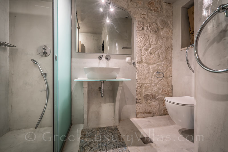 A bathroom of a seaview villa with a pool in Zakynthos
